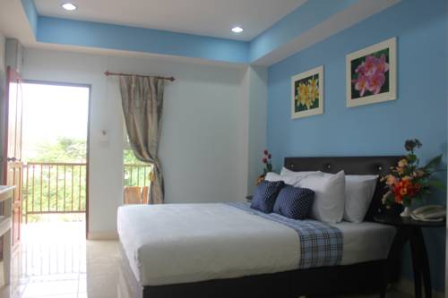 Imagen de la habitación del Hotel The Moonlight Place. Foto 2