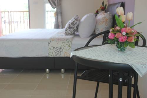 Imagen de la habitación del Hotel The Moonlight Place. Foto 14