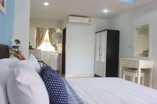 Imagen de la habitación del Hotel The Moonlight Place. Foto 16