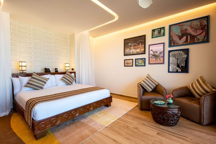 Imagen de la habitación del Hotel The Mora Zanzibar. Foto 14