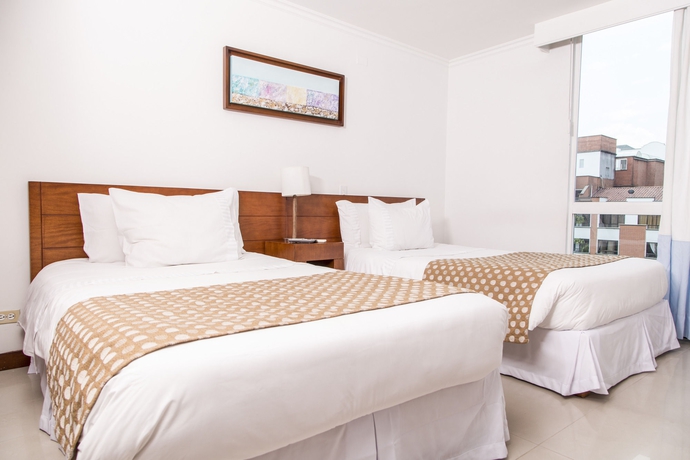 Imagen de la habitación del Hotel The Morgana Poblado Suites. Foto 6