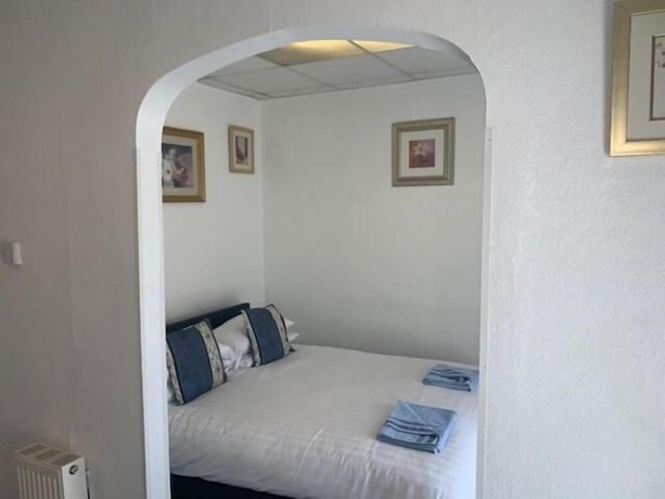 Imagen de la habitación del Hotel The Mornington. Foto 12