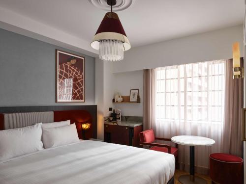 Imagen de la habitación del Hotel The Morris Hotel Sydney. Foto 7