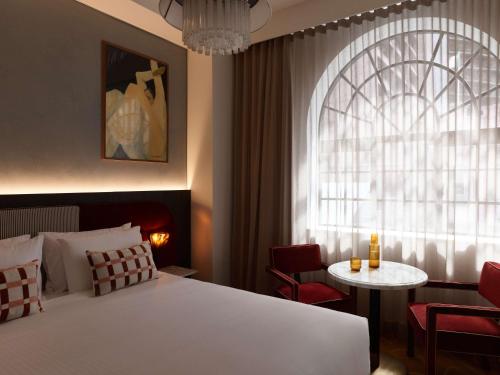 Imagen de la habitación del Hotel The Morris Hotel Sydney. Foto 15