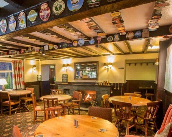 Imagen del bar/restaurante del Hotel The Mortal Man Inn. Foto 7