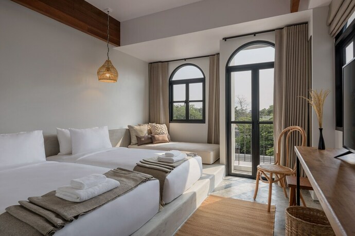 Imagen de la habitación del Hotel The Motifs Eco Hotel. Foto 13
