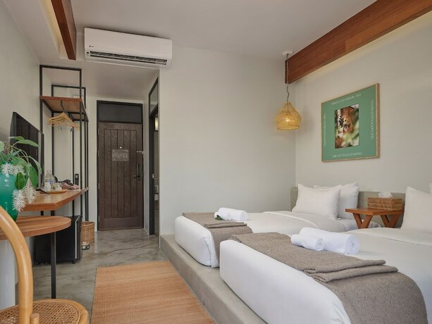 Imagen de la habitación del Hotel The Motifs Eco Hotel. Foto 16