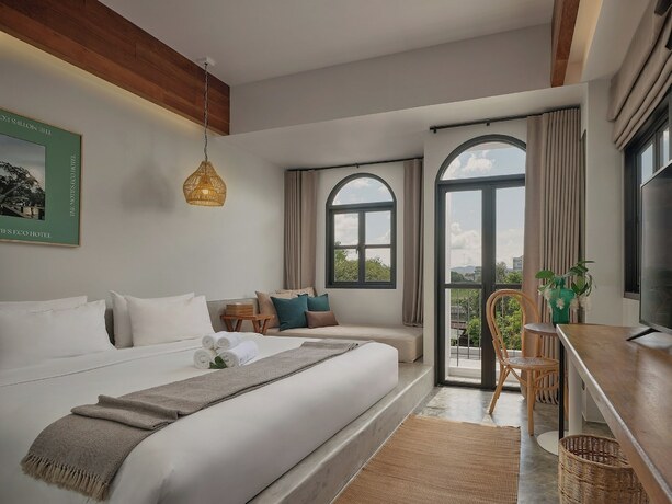 Imagen de la habitación del Hotel The Motifs Eco Hotel. Foto 17