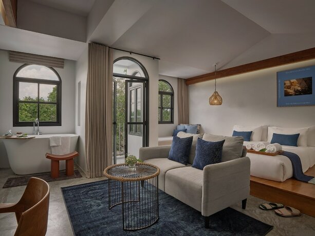 Imagen de la habitación del Hotel The Motifs Eco Hotel. Foto 18