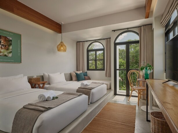 Imagen de la habitación del Hotel The Motifs Eco Hotel. Foto 21