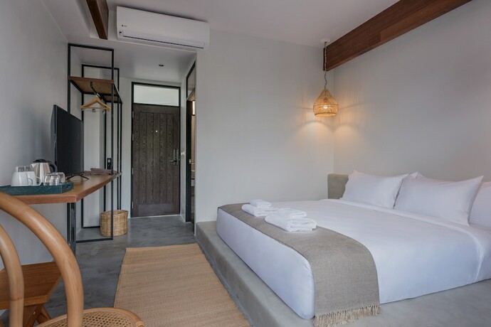 Imagen de la habitación del Hotel The Motifs Eco Hotel. Foto 22