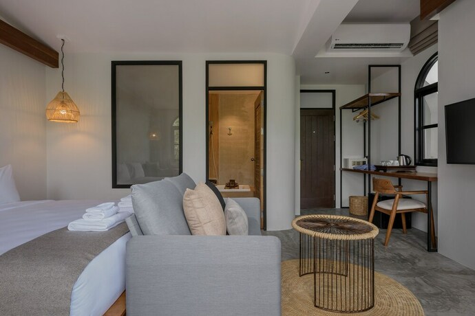 Imagen de la habitación del Hotel The Motifs Eco Hotel. Foto 24