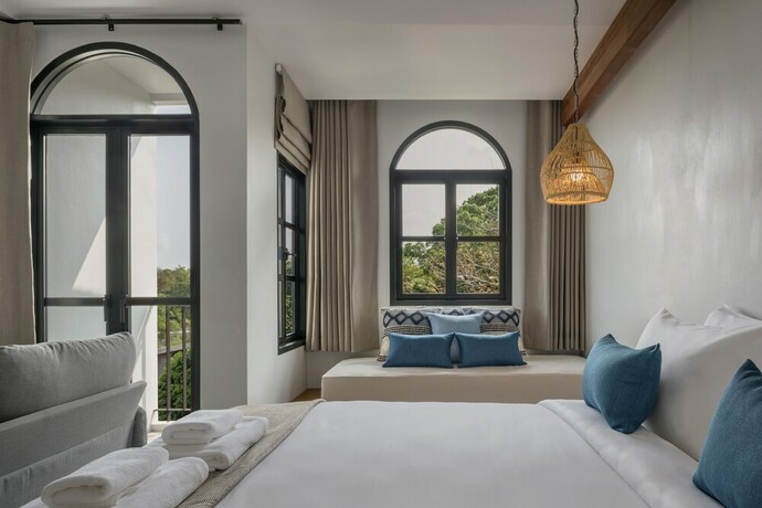 Imagen de la habitación del Hotel The Motifs Eco Hotel. Foto 26
