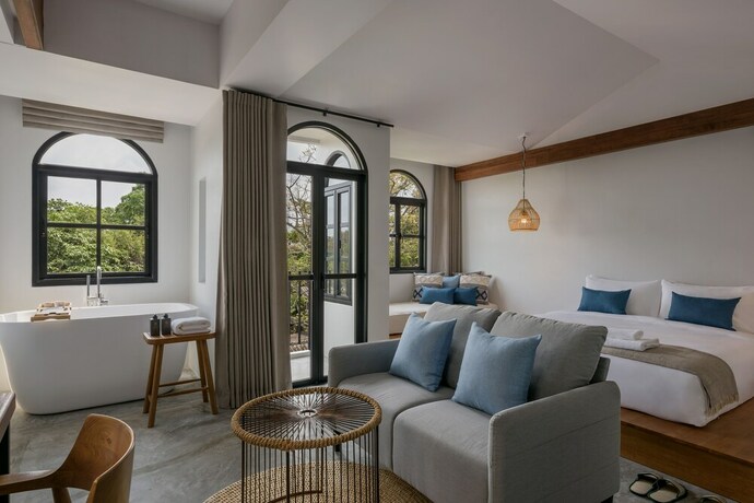 Imagen de la habitación del Hotel The Motifs Eco Hotel. Foto 27