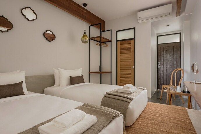 Imagen de la habitación del Hotel The Motifs Eco Hotel. Foto 30