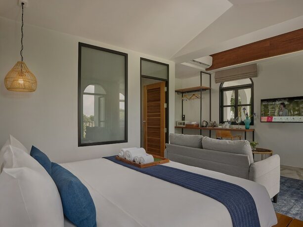 Imagen de la habitación del Hotel The Motifs Eco Hotel. Foto 34
