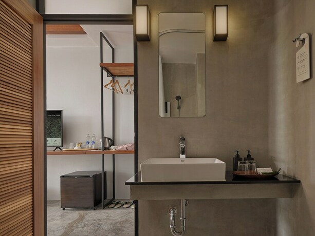 Imagen de la habitación del Hotel The Motifs Eco Hotel. Foto 35