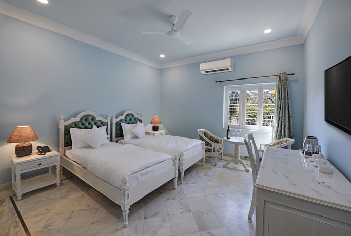 Imagen de la habitación del Hotel The Mount Bunglow - Mount Abu. Foto 3