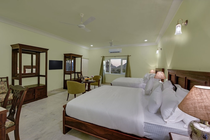 Imagen de la habitación del Hotel The Mount Bunglow - Mount Abu. Foto 4