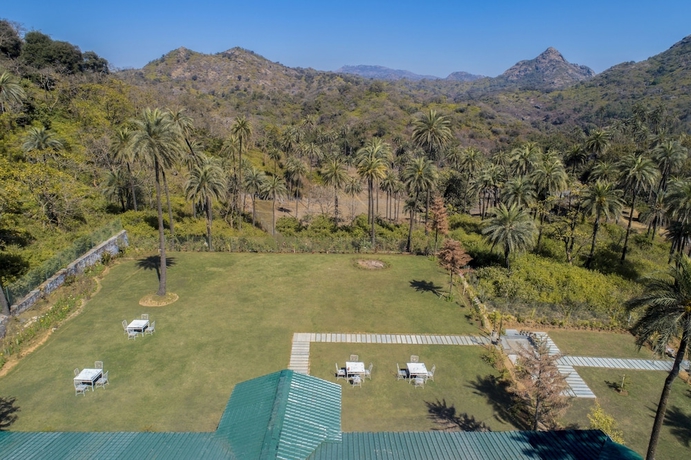Imagen de los exteriores del Hotel The Mount Bunglow - Mount Abu. Foto 13