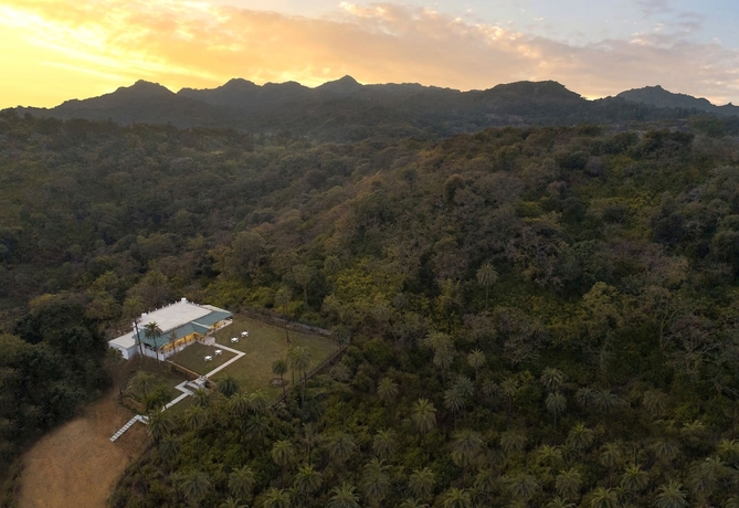 Imagen de los exteriores del Hotel The Mount Bunglow - Mount Abu. Foto 14