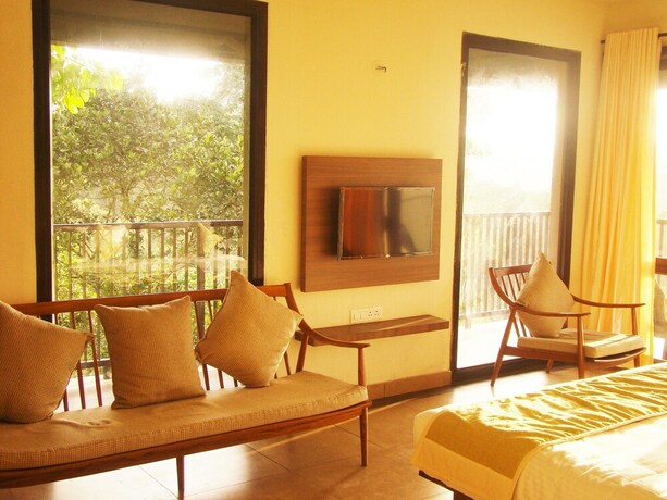 Imagen de la habitación del Hotel The Mountain Courtyard Thekady. Foto 17