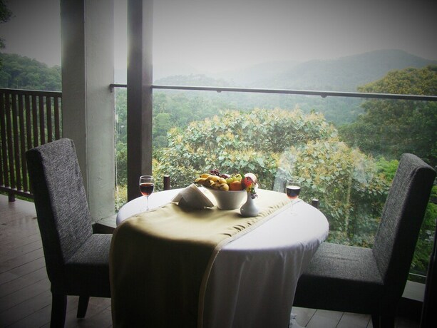 Imagen de la habitación del Hotel The Mountain Courtyard Thekady. Foto 25