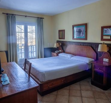 Imagen de la habitación del Hotel The Mountains Hotel. Foto 6