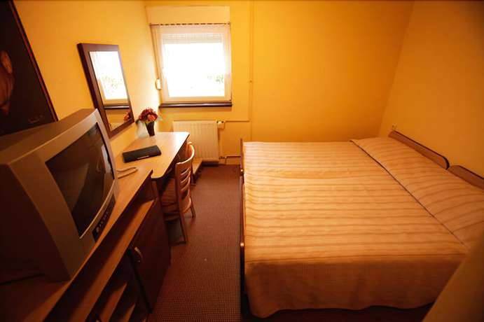 Imagen de la habitación del Hotel The Movie Resort Aparthotel. Foto 17