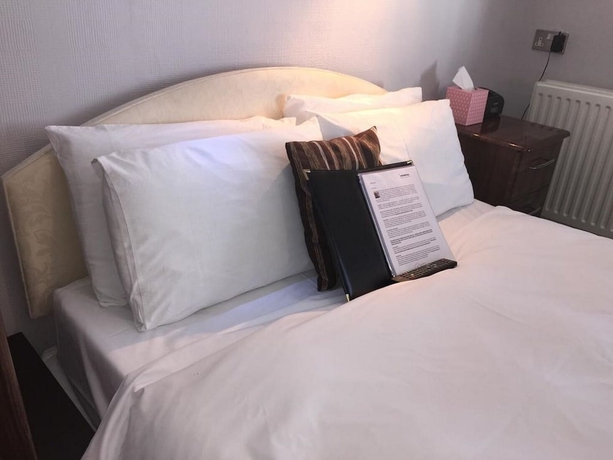 Imagen de la habitación del Hotel The Mowbray. Foto 16