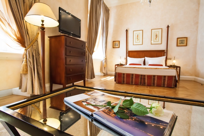 Imagen de la habitación del Hotel The Mozart Prague. Foto 1