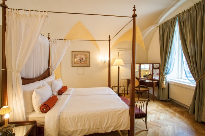 Imagen de la habitación del Hotel The Mozart Prague. Foto 15