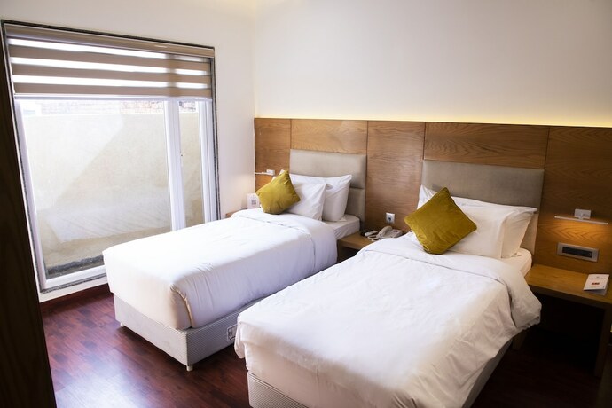 Imagen de la habitación del Hotel The Moziac Gwalior. Foto 19