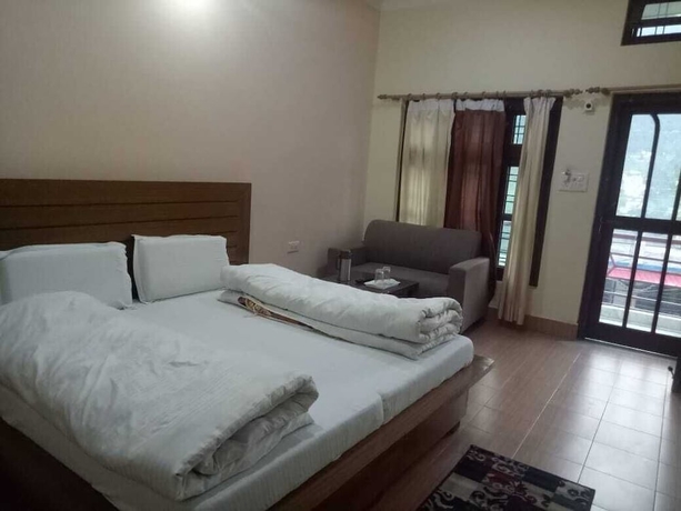 Imagen de la habitación del Hotel The Mrityunjaya Palace Guptakashi. Foto 3