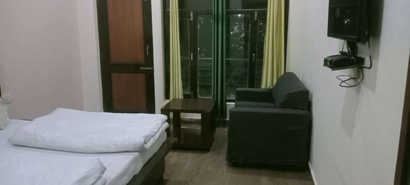 Imagen de la habitación del Hotel The Mrityunjaya Palace Guptakashi. Foto 5
