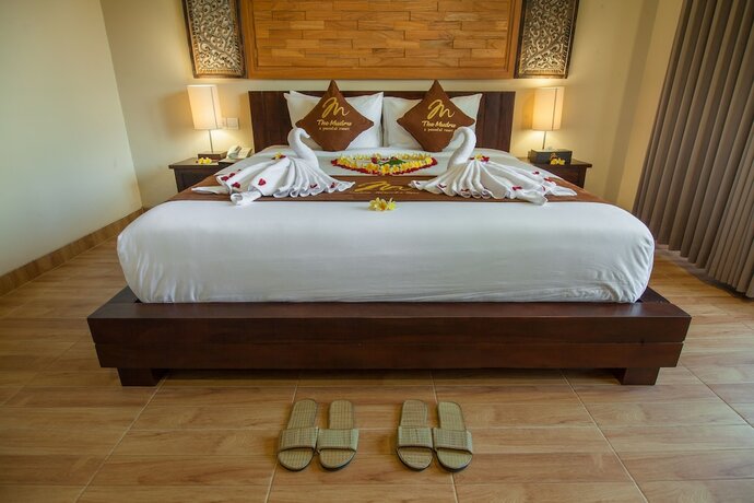 Imagen de la habitación del Hotel The Mudru Resort. Foto 2