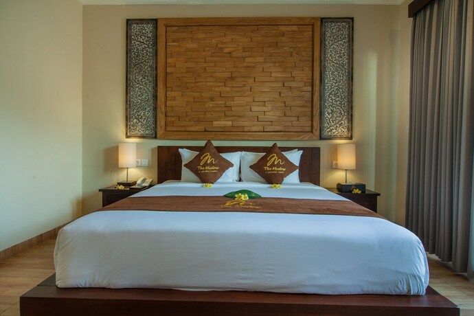 Imagen de la habitación del Hotel The Mudru Resort. Foto 4