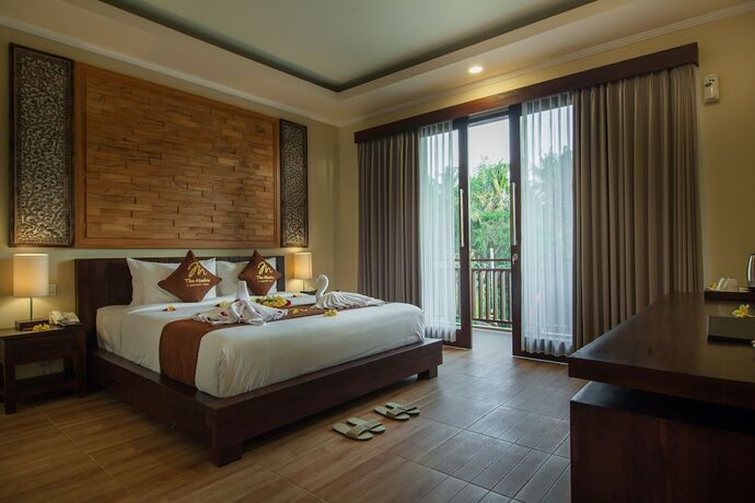 Imagen de la habitación del Hotel The Mudru Resort. Foto 9