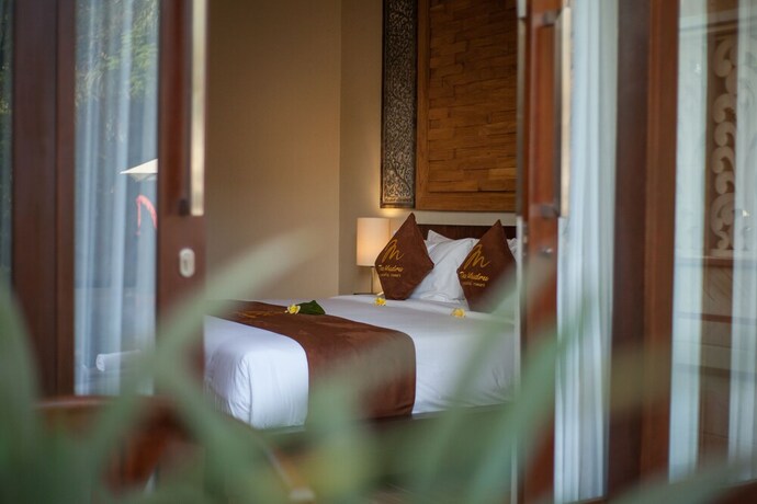 Imagen de la habitación del Hotel The Mudru Resort. Foto 10