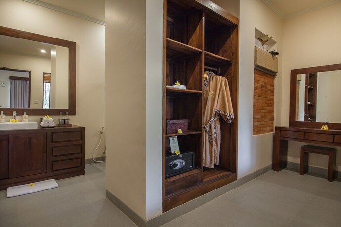 Imagen de la habitación del Hotel The Mudru Resort. Foto 11