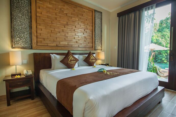 Imagen de la habitación del Hotel The Mudru Resort. Foto 12