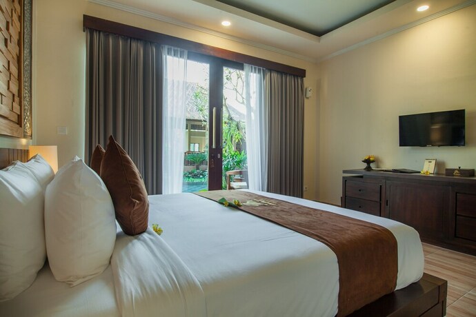 Imagen de la habitación del Hotel The Mudru Resort. Foto 15