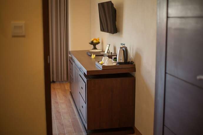 Imagen de la habitación del Hotel The Mudru Resort. Foto 17