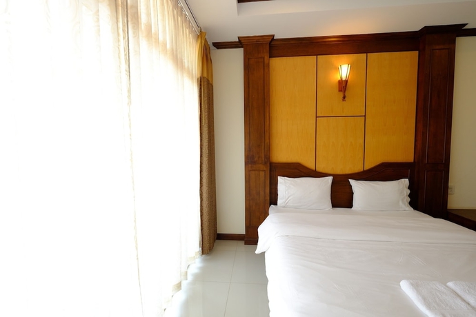 Imagen de la habitación del Hotel The Muk Lagoon. Foto 7