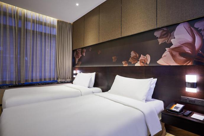 Imagen de la habitación del Hotel The Mulian Guangzhou Zhujiang New Town. Foto 3