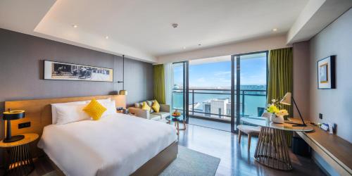 Imagen de la habitación del Hotel The Mulian Jinhai Lake Shanghai. Foto 12