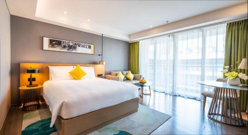 Imagen de la habitación del Hotel The Mulian Jinhai Lake Shanghai. Foto 13