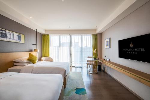 Imagen de la habitación del Hotel The Mulian Jinhai Lake Shanghai. Foto 15
