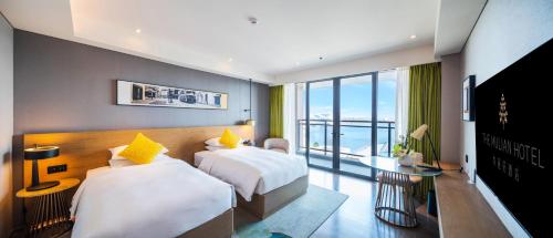 Imagen de la habitación del Hotel The Mulian Jinhai Lake Shanghai. Foto 17