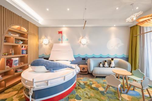 Imagen de la habitación del Hotel The Mulian Jinhai Lake Shanghai. Foto 19